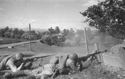Расчет противотанкового ружья сержанта Петрова ведет огонь по противнику  1944 г.Место съемки: Румыния, Северная Трансильвания